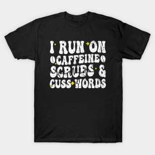 I run on caffeine scrubs & Cuss Words - Funny Nurse Quote T-Shirt